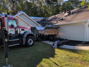 Loading the shingles onto one of the housing units to begin the replacement.