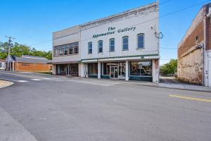21,000± sf. commercial 2 story Class C building in downtown historic Appomattox, VA.  The building boosts wood floors, great visibility and is located within the Opportunity Zone just off of Main Street.  Online 