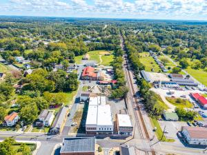 21,000± sf. commercial 2 story Class C building in downtown historic Appomattox, VA.  The building boosts wood floors, great visibility and is located within the Opportunity Zone just off of Main Street.  Online 