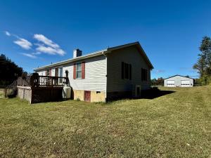 3 BR/2 BA single level home on 1.08 +/- acres with detached 5,000± sf. shop/garage w/3 bay doors, heating/cooling & restroom located only .3 mile off Rt. 20 2 miles from downtown Orange