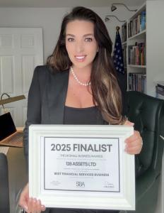 Selina Jayne Weaver, founder of 128 Assets Ltd, proudly holds her framed 2025 UK Small Business Awards finalist certificate for Best Financial Services Business.
