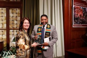 Dr. Joseph Green accepting humanitarian award