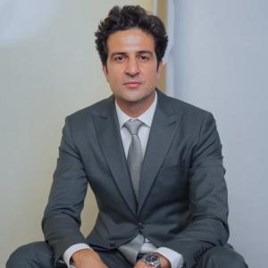 A professional portrait of Dr. Mustafa Sultan, Founder of Structures AI, representing innovation in artificial intelligence and engineering.