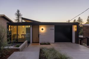 front door and garage at street level