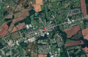 7-bedroom, 4.5-bath Victorian residence sits on a .27± acre lot and includes a detached 1BR/1BA guest cottage/office, a detached pool house with garage/carriage house, and a beautiful courtyard with an in-ground saltwater pool.