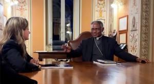 His Eminence Cardinal Peter Turkson, Chancellor of the Pontifical Academy of Sciences and the Pontifical Academy of Social Sciences, with Maryna Ovtsynova, President of the ALLATRA International Public Movement