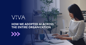 Executive Assistant using a computer with caption: How Viva adopted AI across the organization
