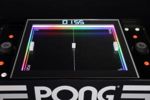 A closer look at the Atari PONG Coffee Table showing the 3D paddles on the playfield