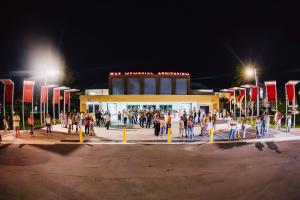 Image of a building with people outside.