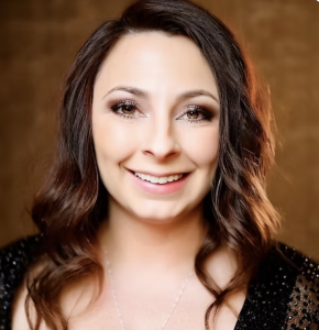 Professional headshot of Amy Smitke, LISW-S, LICDC, Co-Founder of TheraVault, smiling warmly at the camera.