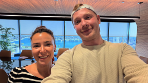 SUPERAGENT AI CEO Vlada Lotkina and CTO Vadym Shashkov, standing together in a professional setting. Lotkina, on the left, is a woman with a confident expression, and Shashkov, on the right, is a man also looking confident. They are the key executives beh