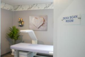 The DEXA Scan Room at Confidia Health Institute in Bristol, Connecticut, showing the Hologic Horizon DXA scanner used for advanced body composition and bone density testing.