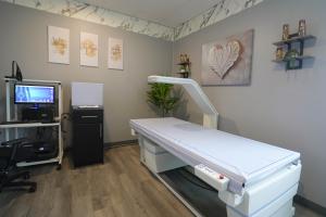 The MetaLab DEXA scanner at Confidia Health Institute in Bristol, Connecticut, showing the Hologic Horizon DXA system used for advanced body composition and bone density analysis.