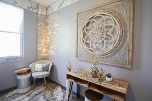 A relaxing seating area inside MetaLab at Confidia Health Institute in Bristol, Connecticut, featuring soft lighting, modern décor, and comfortable furnishings designed to enhance the patient experience.