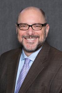 Image of Cameron Dunn, Co-Chair of the Wireless Broadband Alliance