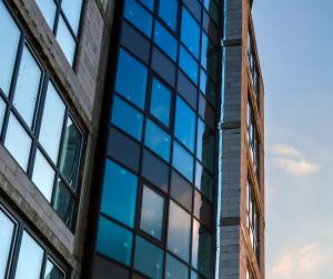 Exterior of a commercial building with open sky in the background.