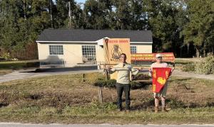 Co founders in front of the future home of Belleau Wood Tavern
