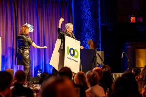 Kristin Mott, Founder and Managing Partner of Amberlake Capital, delivers remarks at the 100 Women in Finance New York Gala, describing herself as a “walking billboard” for the organization.