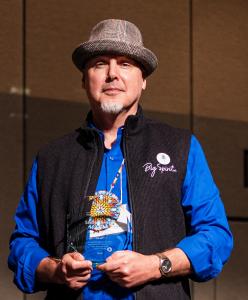 Shanne Soulier holding his Stellar Award