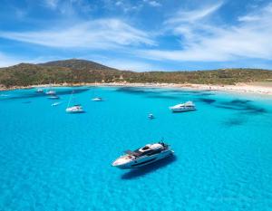 Luxury yachts chartered by KissFromItaly in the beautiful sea of Sardinia, Italy