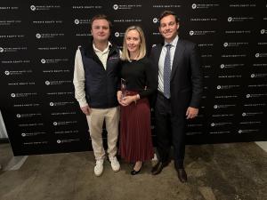 Photo of Dasseti team collecting the 2025 US award for ODD Solution Provider of the Year