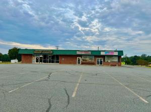 10,230± sq. ft. commercial building with loading dock on 2.96± acres • 732± ft. of Rt. 29 frontage and 650± ft. of Rt. 29 Business frontage with exceptional visibility and exposure • Four individual units, each with restrooms; all currently leased.