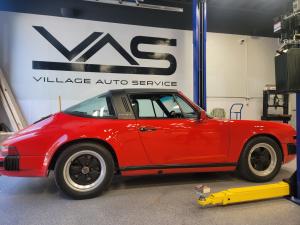Red classic Porsche at Village Auto Service