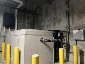 Commercial kitchen grease interceptor used to trap fats, oils, and grease, preventing sewer blockages and protecting plumbing systems.