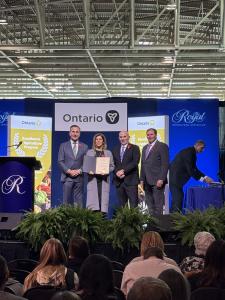 Julie Thurgood-Burnett being presented with an Honoury Mention in The Women in Excellence in Agriculture