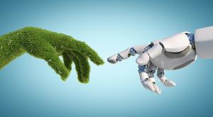 A robotic hand and a grass-covered human hand reaching toward each other, representing collaboration between AI and sustainability in the UK’s transition to Net Zero.