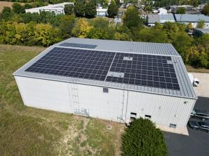 Millwest Amish Furniture warehouse featuring 220 recently add solar panels