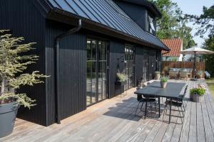 Grønne Helårshuse fra 3Huse: Tidløst Design med Energibevidst Sjæl