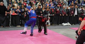Martial Artist, Point Fighter and member of Team Canada, Eli Cooper punching a member of Team USA while fighting for Gold at the 2025 WKC World Championships