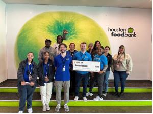 Houston Food Bank Staff with 2024 donation (Image credit: Thomas J Henry)