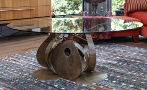 Bronze sculpture of stringed instruments supporting a 35-inch diameter glass top by Arman (born in France, Armand Fernandez, 1928-2005), title Euterpe, marked “Fondorio de Gour” and dated 2001. Estimate: $15,000-$25,000.