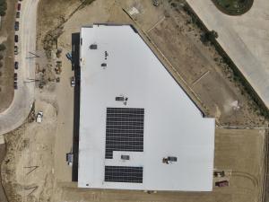Rooftop solar array installed at the new 3 Men Movers campus in East Austin