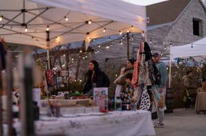 Shoppers enjoy discovering one-of-a-kind gifts and holiday treats from artisan vendors.