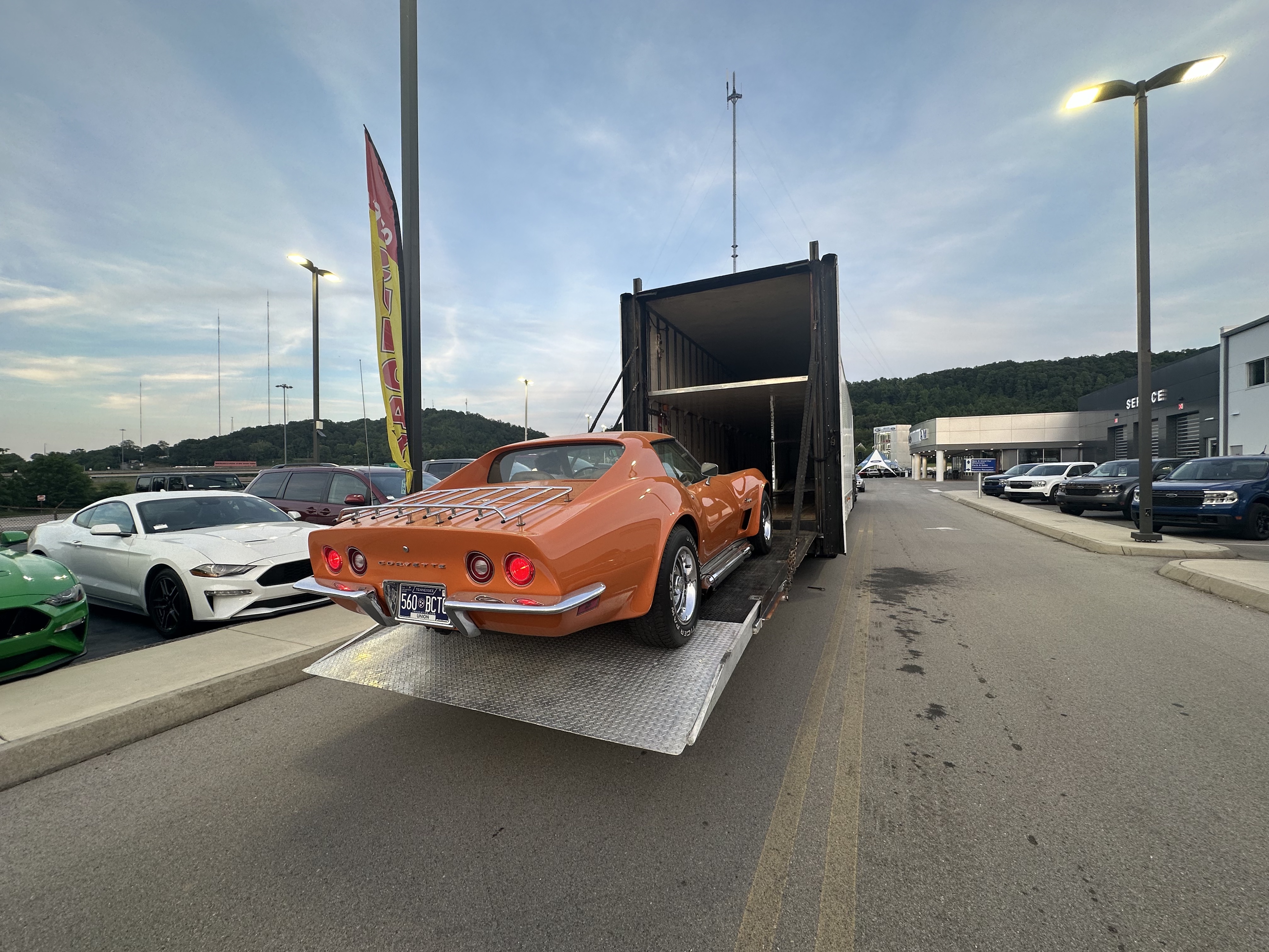 Corvette Being Loaded for Transport