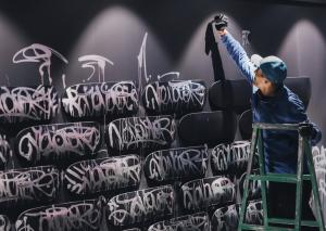 JonOne in action at the Museum of Graffiti in Shanghai, China, 2024.