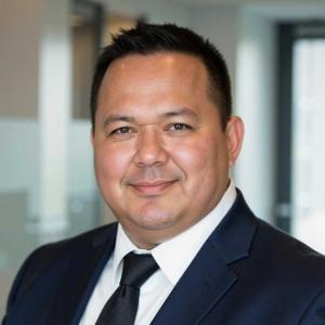 Portrait of Ron “Hawk” Spoerl, Founder and CEO of Aambé™ Corporation, representing Aambé’s leadership in empowering Tribal Nations through innovation, cultural celebration, and community partnerships.