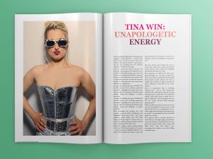 Magazine spread showing pop artist Tina Win in embellished sunglasses and denim corset on left page, with article headline "Tina Win: Unapologetic Energy" on right page