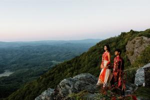 Indian wedding on cliffside terrace at Twickenham House NC with Blue Ridge Mountain views