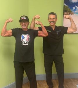 Dr. Mark D. Jacobson and Andy Bostinto, who at 100 years old, remains the oldest living competitive bodybuilder