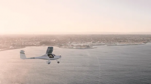 Electric Pipistrel aircraft soars over Western Australia's Fremantle Harbour
