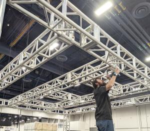 Smartstage setting up truss structures from local hardware inventory for a global brand activation client hosting an event in Las Vegas