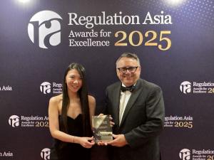 GRC Solutions team members accepting the award at the Regulation Asia Award 2025