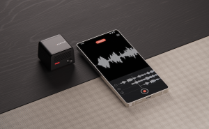 Audigo mic and Android app on cabinet with mesh grill