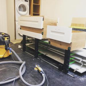 Drying freshly painted kitchen cabinets onsite can save painters time and homeowners money