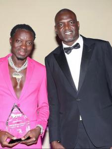 Afrikicks Founder Oumarou Idrissa with honoree Michael Blackson, comedian, actor, and philanthropist, at the Afrikicks Gala 2024.