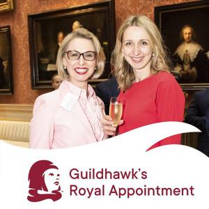 Photo of Guildhawk CEO, entrepreneur and software coder Jurga Zilinskiene MBE and Rita Metlovaite Head of Client Business Transformation, Guildhawk attending a Royal Appointment at Buckingham Palace Reception as the Winners of the Queens Award for International Trade.